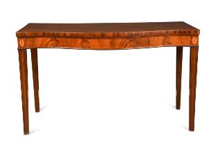 A George III inlaid mahogany serpentine serving table,