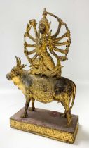 A Thai (Rattanakosin) gilded and red-painted bronze of Shiva upon the Nandi Bull, 19th/20th century,