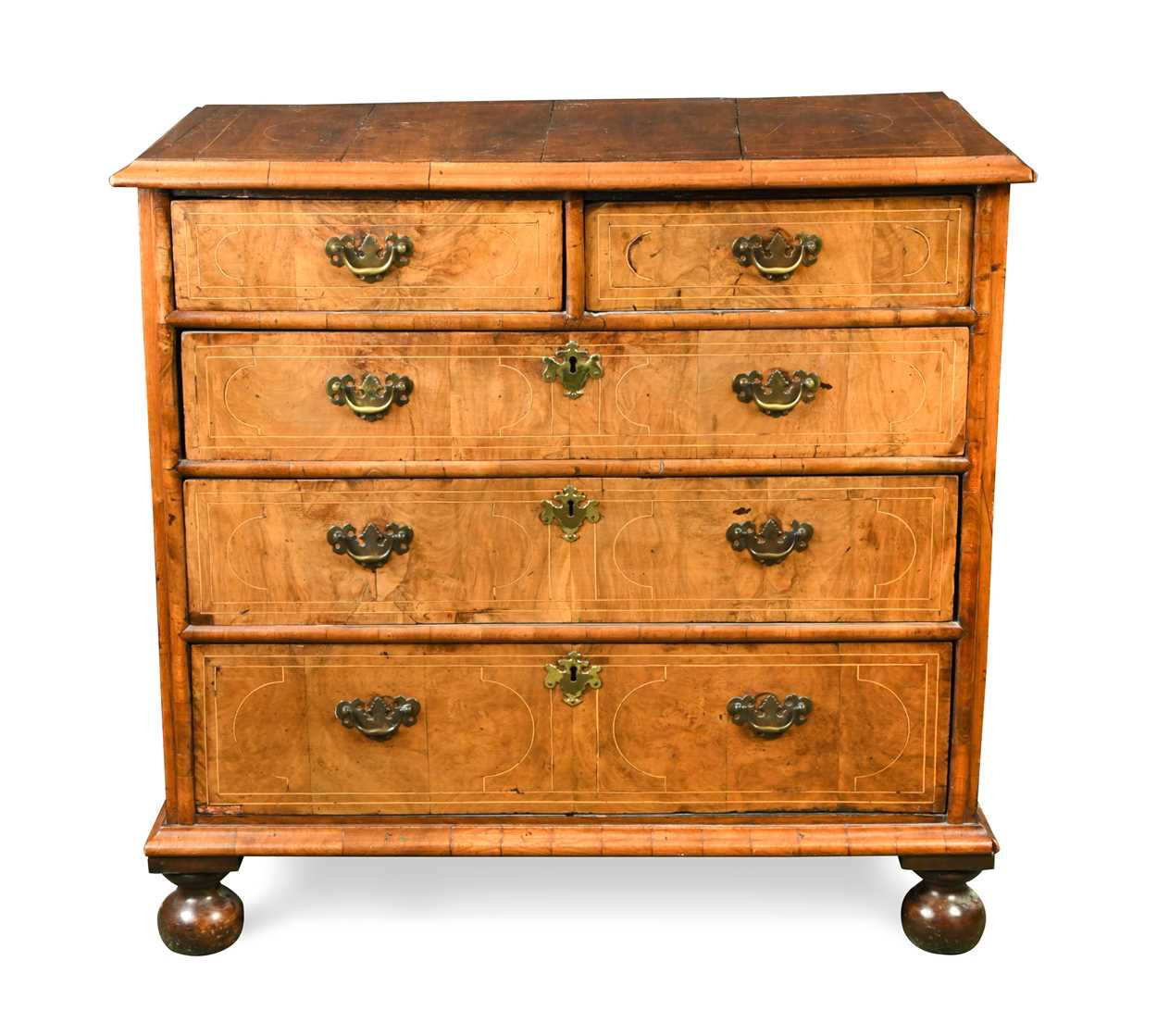 A walnut and boxwood line inlaid chest of drawers, early 18th century,