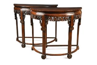 A pair of Chinese hongmu demi lune tables, late Qing Dynasty,