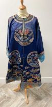 A Chinese blue silk jacket, 20th century,