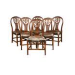 A set of six Hepplewhite mahogany dining chairs, late 18th century,