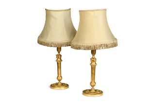 A pair of gilt bronze candle stick lamps, 19th century,