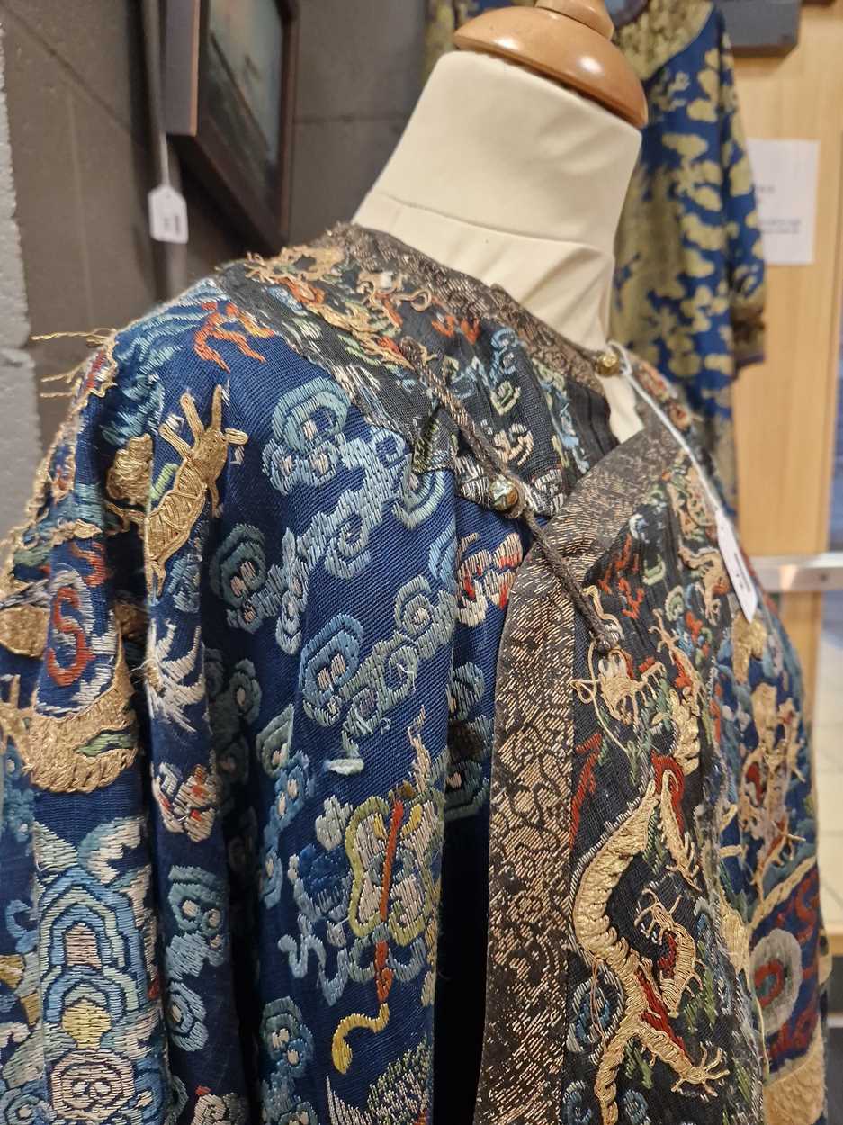 A Chinese embroidered silk blue ground dragon robe, late Qing Dynasty, - Image 9 of 18