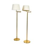 A pair of brass articulated reading lamps,