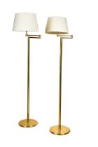 A pair of brass articulated reading lamps,