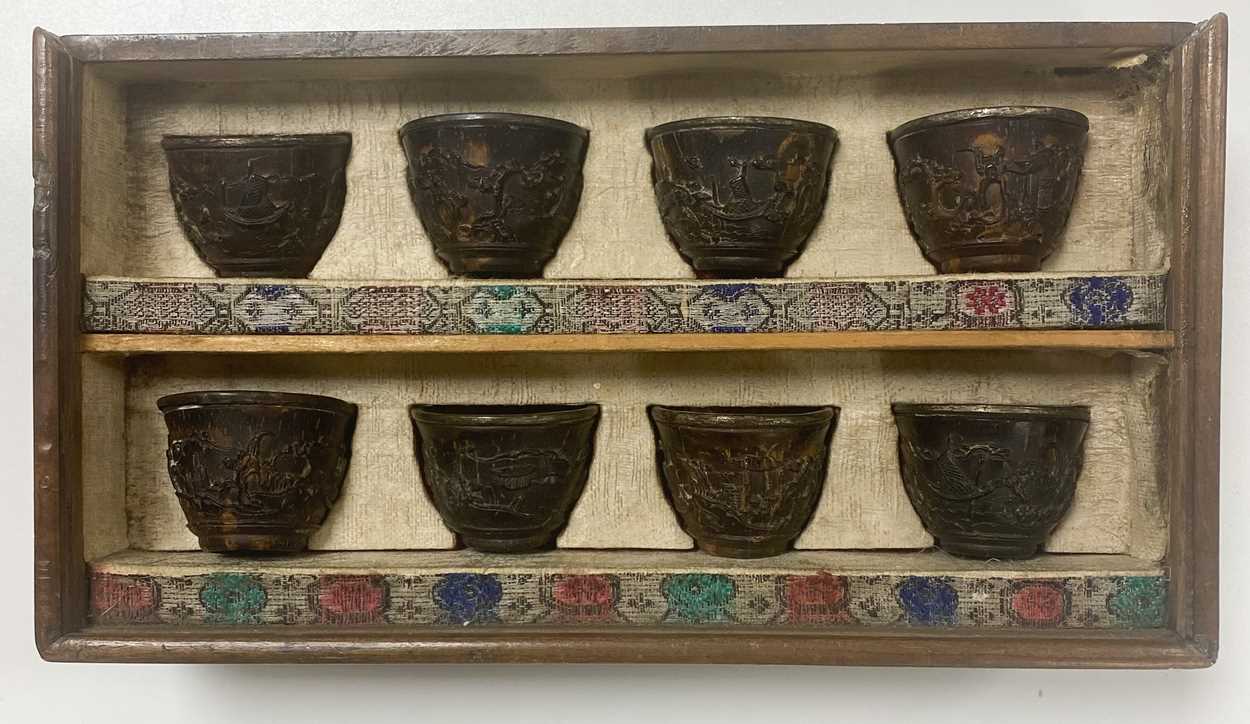 A set of eight Chinese export carved and silver mounted coconut wood wine cups, Qing Dynasty, early - Image 4 of 20