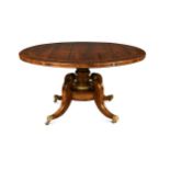 A Regency rosewood and brass inlaid centre table,
