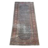 A large Feraghan kelly rug, circa 1920,