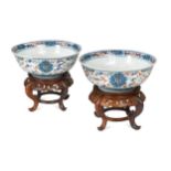 A pair of Chinese Doucai porcelain bowls, each with seal marks of the Qianlong Emperor but later,