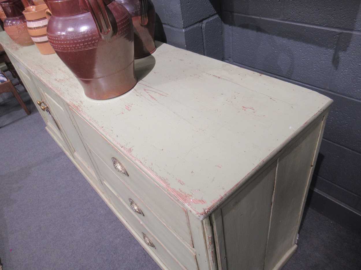 A late Victorian green painted pine kitchen dresser base, - Bild 5 aus 10