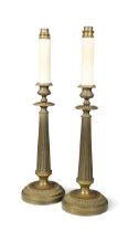 A pair of bronze column table lamps,