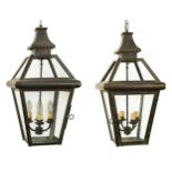 A pair of four light brass hanging hall lanterns, early 20th century,