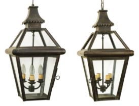 A pair of four light brass hanging hall lanterns, early 20th century,