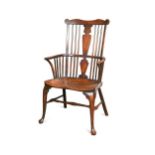 A Thames Valley cherry, walnut and elm comb-back armchair, circa 1785,