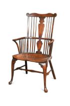 A Thames Valley cherry, walnut and elm comb-back armchair, circa 1785,