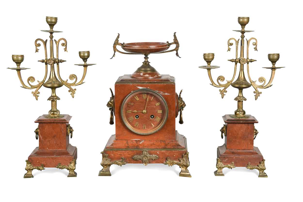 A French rosso antico marble clock garniture, 19th century,