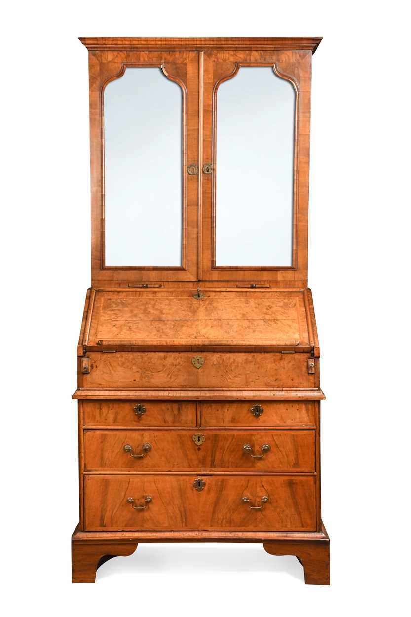 A walnut bureau cabinet, early 18th century,