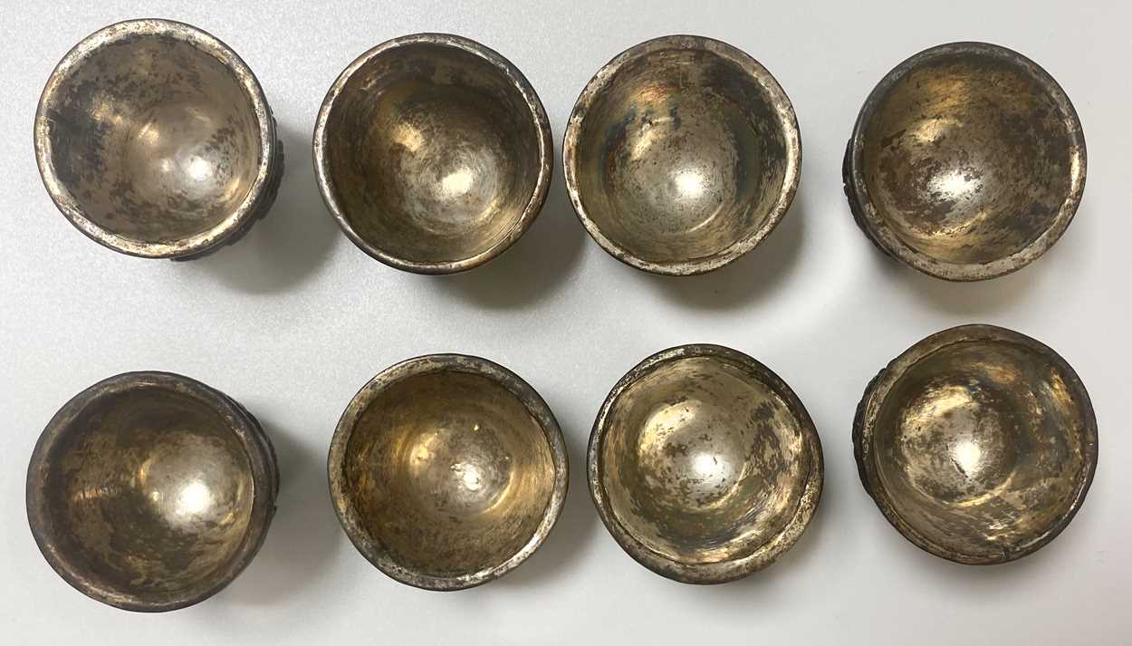A set of eight Chinese export carved and silver mounted coconut wood wine cups, Qing Dynasty, early - Image 2 of 20