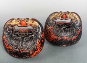 A pair of Japanese carved and red lacquered Zen temple bells, Mokuygo, late Meiji Period,