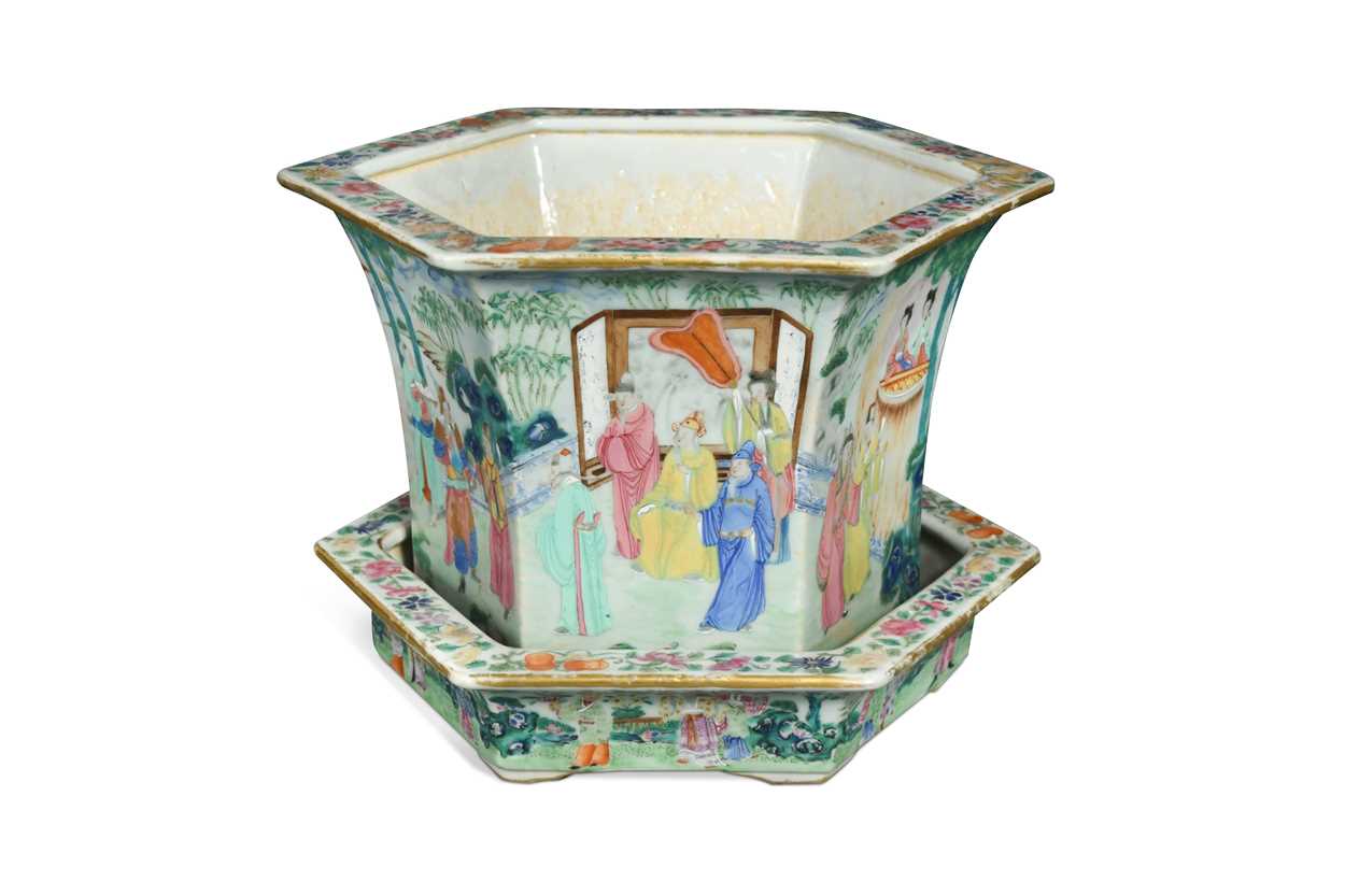 A Chinese famille rose Canton decorated hexagonal planter on stand, Qing Dynasty late 19th century,