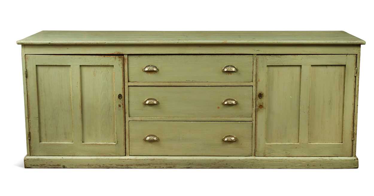 A late Victorian green painted pine kitchen dresser,