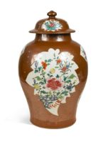 A Chinese cafe-au-lait ground porcelain vase and cover, Qianlong, circa 1750,