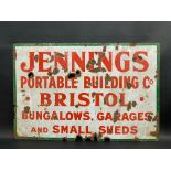 A rectangular enamel sign advertising Jennings Portable Building Co. of Bristol, made by Wildman &