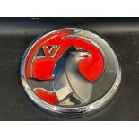 A Vauxhall dealership circular plaque, 10" diameter plus a Whitbread White Label Bitter enamel