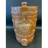 A salt glazed stoneware barrel marked Sherry, and having moulded decoration including a Royal coat