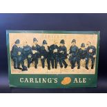 A Carling's Ale pictorial tin advertising showcard titled 'Nine Pints of the Law', after a design by