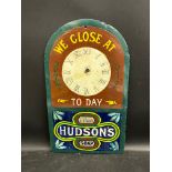 A Hudson's Soap enamel clock sign, heavily restored, 10 1/2 x 18".
