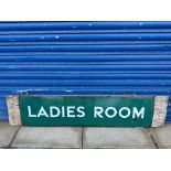 A British Railways Southern Region enamel station sign for Ladies Room, attached to a wooden