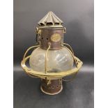An unusual brass and copper lamp, by Hugh Douglas of Liverpool, converted to electricity, 13 1/2"