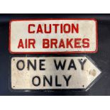 A Caution Air Brakes embossed metal sign 16 3/4 x 6 1/2", plus a second 'One Way Only', 18 x 7".