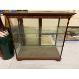 A Fry's Chocolates counter top display cabinet with incised gilded lettering to three of the