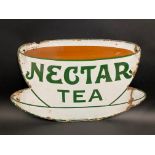 A Nectar Tea enamel sign in the shape of a teacup and saucer, by Patent Enamel, 21 x 12 1/2".