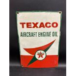 A reproduction advertising sign for Texaco, 10 x 14".