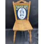 An older reproduction Quaker Oats advertising department store style chair, the enamel sign back
