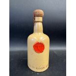 An unusual Carltonware Guinness stoneware bottle with red wax seal to the front, 7" h.