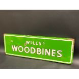 A Wills's Woodbines rectangular enamel sign of good bright colour, 28 x 9".