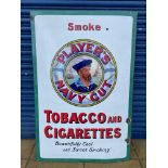 A large Player's Navy Cut Tobacco and Cigarettes pictorial enamel sign with central 'sailor'