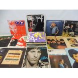 A quantity of mixed era 45 singles LPs, from the 1960s to 1980s including The Beatles For Sale,