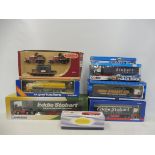 A quantity of boxed die-cast vehicles, mainly heavy haulage, various makers.