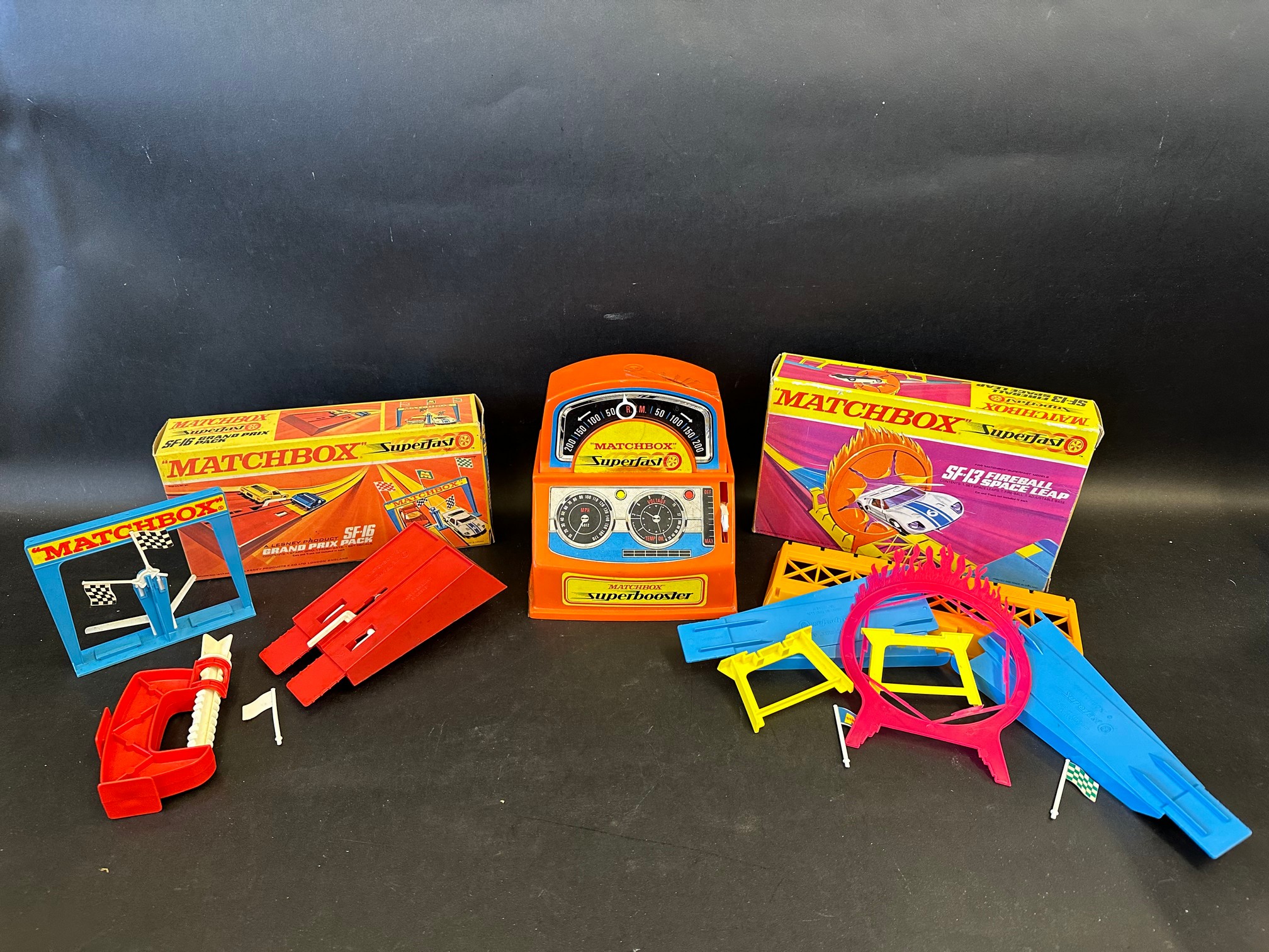 Two Matchbox Superfast accessory packs, SF-13 Fireball Space Leap and SF-16 Grand Prix Pack, plus
