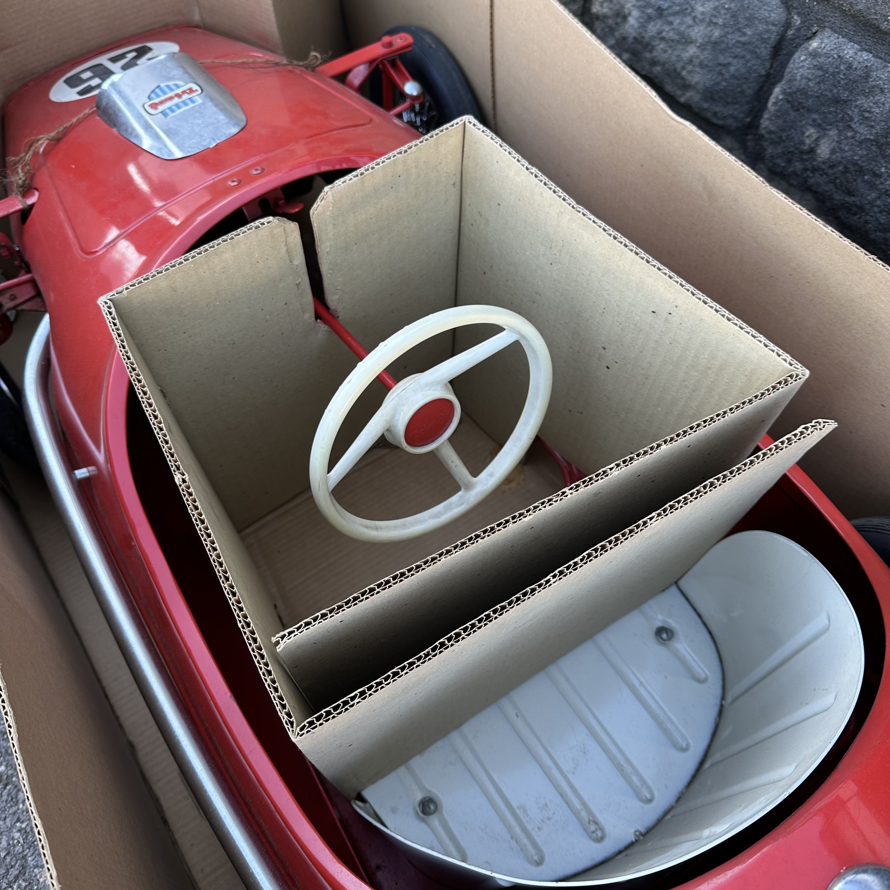 A Tri-ang Toys Grand Prix racing car in Ferrari Red, in original box with innards, approx 5ft - Image 3 of 7