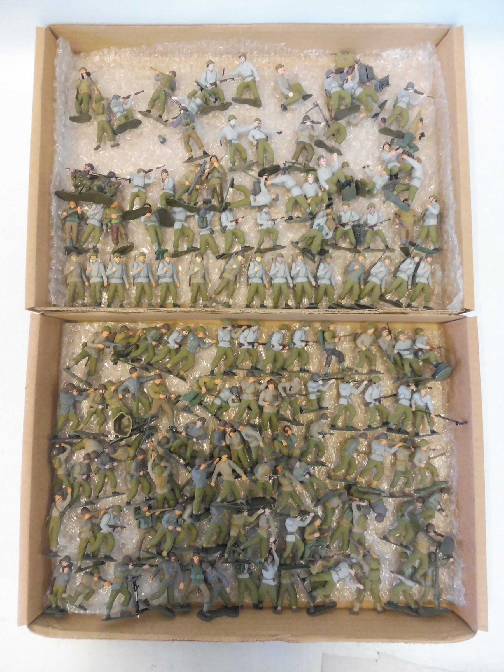 Two trays of WWII era Russian soldiers.