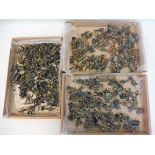 Three trays of well painted plastic WWII German soldiers.