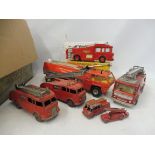 A selection of playworn emergency services fire tenders including Corgi and Dinky.