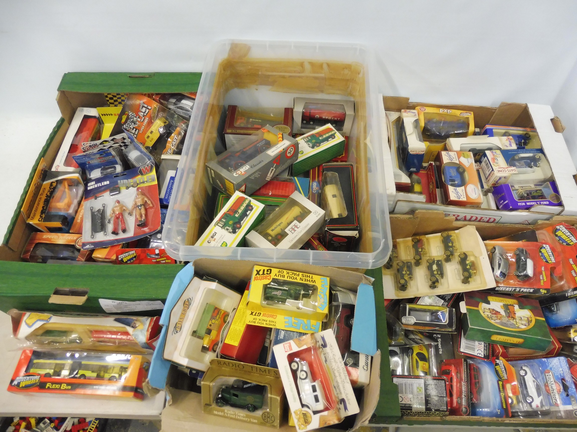 A large quantity, across four boxes, of various die-cast: EFE, Days Gone and other makers.